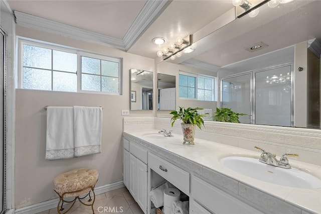 11180 Bertrand Ave, Granada Hills, CA 91344 - bathroom with ornamental molding, plenty of natural light, double vanity, a shower stall, and baseboards