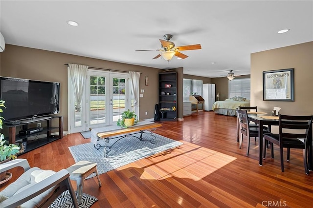 11180 Bertrand Ave, Granada Hills, CA 91344 - living room featuring a ceiling fan, healthy amount of natural light, wood finished floors, french doors, and recessed lighting