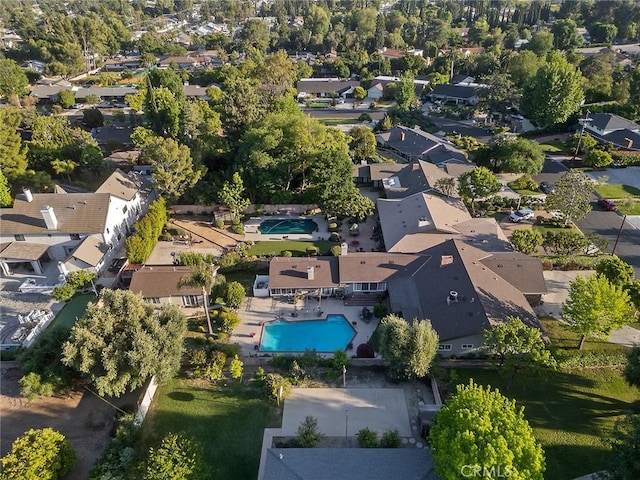 11180 Bertrand Ave, Granada Hills, CA 91344 - aerial view of property and surrounding area with nearby suburban area and a pool area