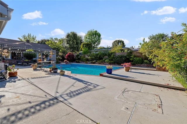 11180 Bertrand Ave, Granada Hills, CA 91344 - view of swimming pool with a patio