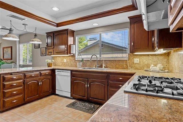 11180 Bertrand Ave, Granada Hills, CA 91344 - kitchen featuring a sink, white dishwasher, gas stovetop, a raised ceiling, and tasteful backsplash