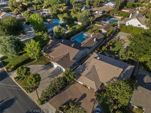 11180 Bertrand Ave, Granada Hills, CA 91344 - aerial view of property's location featuring a pool area and nearby suburban area