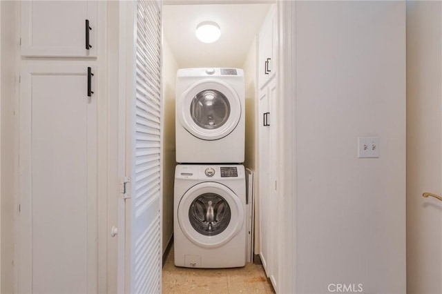 1375 Kelton Ave Unit 104, Los Angeles, CA 90024 - laundry area with stacked washer / drying machine