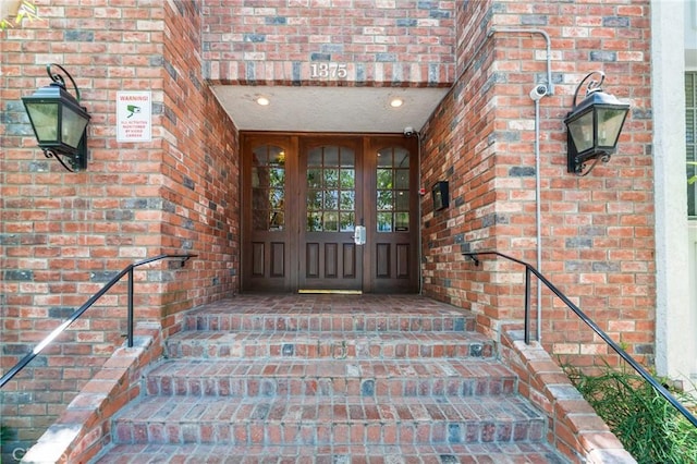 1375 Kelton Ave Unit 104, Los Angeles, CA 90024 - property entrance featuring brick siding