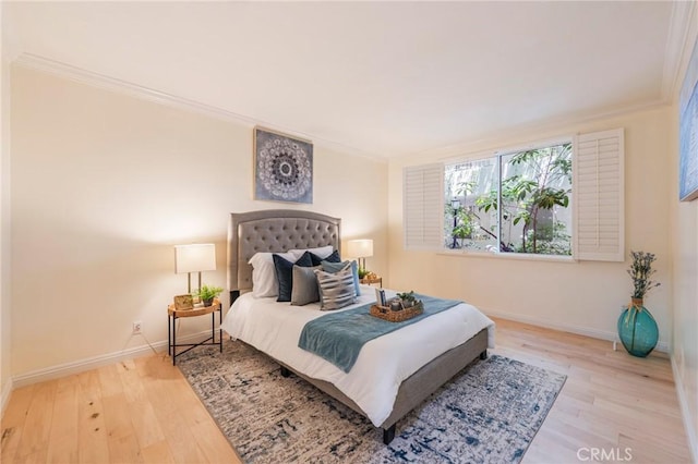 1375 Kelton Ave Unit 104, Los Angeles, CA 90024 - bedroom with ornamental molding, baseboards, and wood finished floors
