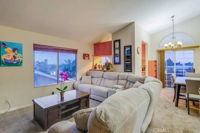 1775 Freeman Ave Unit 304, Long Beach, CA 90804 - living area with a chandelier, vaulted ceiling, light carpet, and plenty of natural light