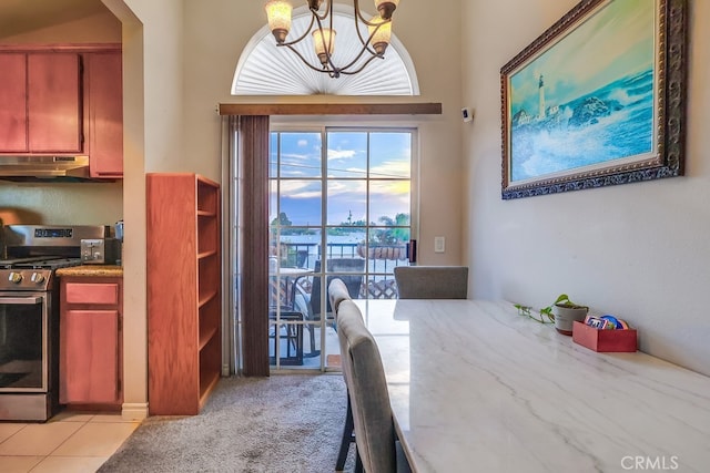 1775 Freeman Ave Unit 304, Long Beach, CA 90804 - dining space with a chandelier and arched walkways