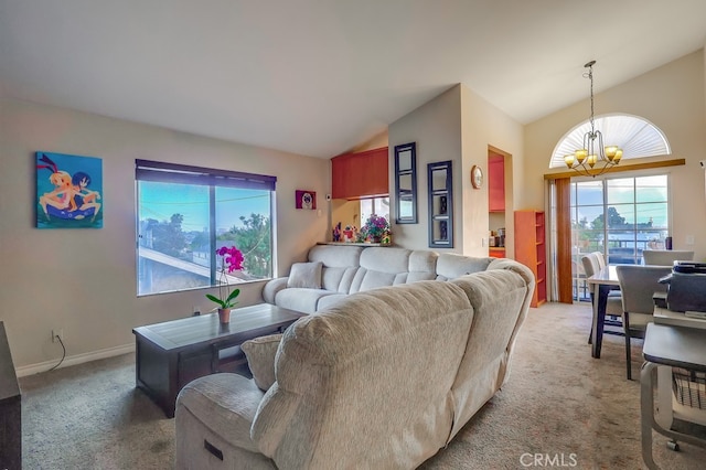 1775 Freeman Ave Unit 304, Long Beach, CA 90804 - living area with a chandelier, light carpet, lofted ceiling, and baseboards