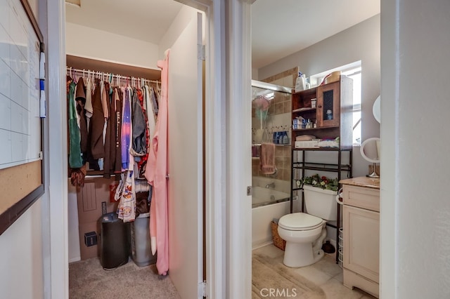 1775 Freeman Ave Unit 304, Long Beach, CA 90804 - bathroom featuring vanity, toilet, shower / bathtub combination, and a spacious closet