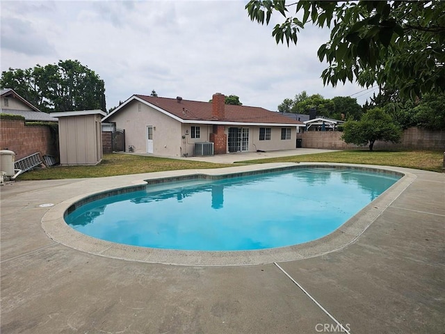 17415 Minnehaha St, Granada Hills, CA 91344 - view of pool with a patio area and central AC