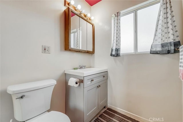 17415 Minnehaha St, Granada Hills, CA 91344 - bathroom with toilet, vanity, and baseboards