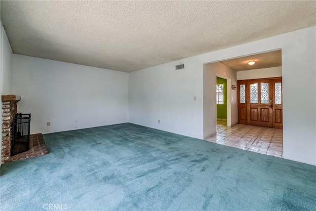17415 Minnehaha St, Granada Hills, CA 91344 - unfurnished living room with carpet and a textured ceiling