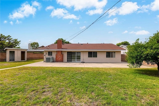 17415 Minnehaha St, Granada Hills, CA 91344 - rear view of house with a patio area, central AC, stucco siding, and a chimney