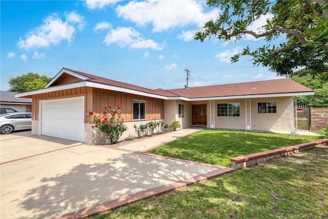 17415 Minnehaha St, Granada Hills, CA 91344 - single story home featuring board and batten siding, a garage, driveway, and a front lawn