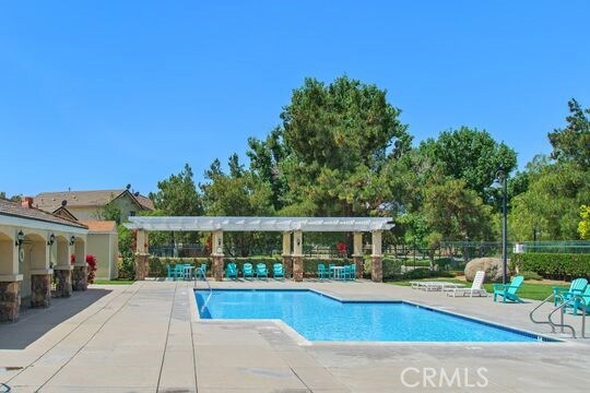 4516 Streamport Dr, Riverside, CA 92505 - community pool with a patio area and a pergola