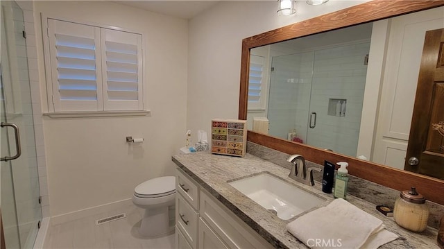 221 Darfo Dr, Crestline, CA 92325 - full bathroom featuring vanity, a shower stall, tile patterned flooring, toilet, and baseboards