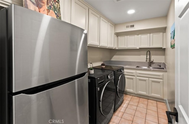 27773 Hidden Trail Rd, Laguna Hills, CA 92653 - laundry area featuring washer and clothes dryer, light tile patterned flooring, and recessed lighting