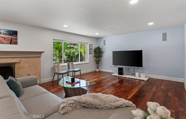 27773 Hidden Trail Rd, Laguna Hills, CA 92653 - living room featuring wood finished floors, baseboards, recessed lighting, and a fireplace