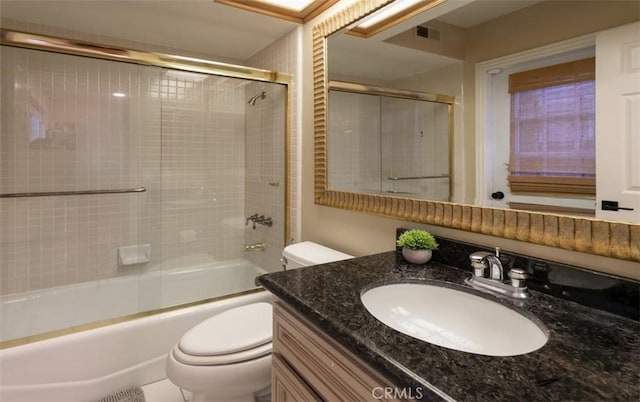 27773 Hidden Trail Rd, Laguna Hills, CA 92653 - bathroom with toilet, vanity, and enclosed tub / shower combo