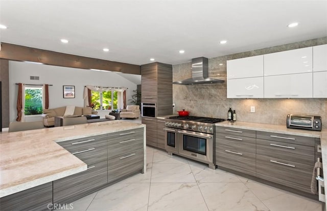 27773 Hidden Trail Rd, Laguna Hills, CA 92653 - kitchen with wall chimney exhaust hood, stainless steel appliances, modern cabinets, recessed lighting, and white cabinetry
