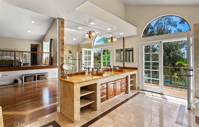 27773 Hidden Trail Rd, Laguna Hills, CA 92653 - kitchen with open shelves, healthy amount of natural light, recessed lighting, high vaulted ceiling, and light stone countertops