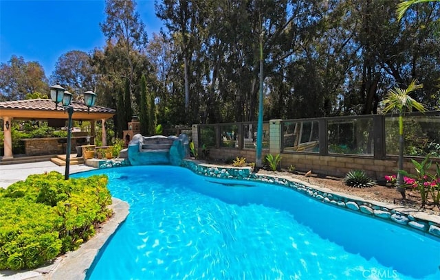 27773 Hidden Trail Rd, Laguna Hills, CA 92653 - outdoor pool with a gazebo and view of scattered trees