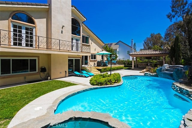27773 Hidden Trail Rd, Laguna Hills, CA 92653 - view of swimming pool with a gazebo, a patio area, a pool with connected hot tub, and a lawn