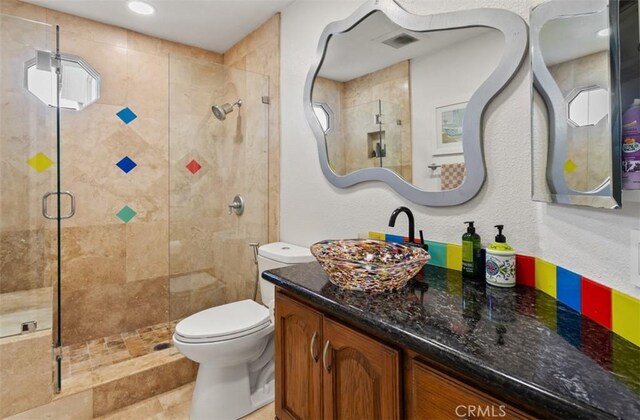 27773 Hidden Trail Rd, Laguna Hills, CA 92653 - full bathroom with a shower stall, vanity, and toilet