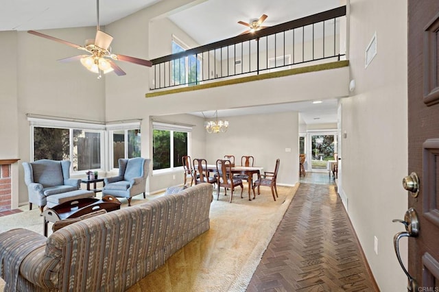 8468 Calle Morelos, San Diego, CA 92126 - living area with a ceiling fan, a high ceiling, baseboards, and a chandelier