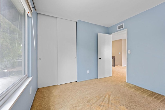 8468 Calle Morelos, San Diego, CA 92126 - unfurnished bedroom with carpet flooring and a closet