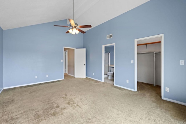 8468 Calle Morelos, San Diego, CA 92126 - unfurnished bedroom with high vaulted ceiling, a spacious closet, carpet floors, baseboards, and ensuite bathroom