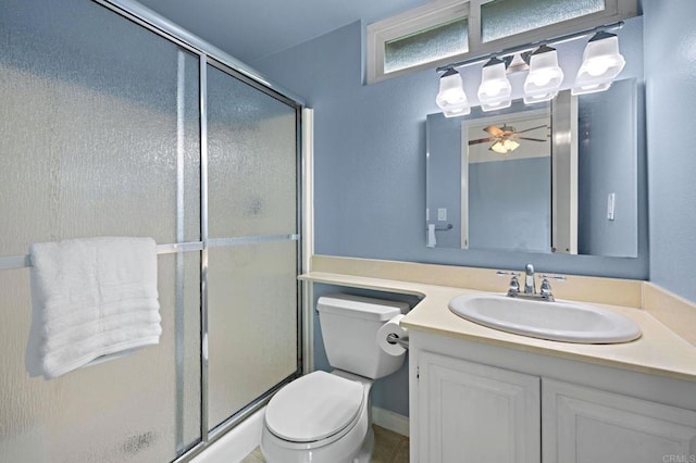 8468 Calle Morelos, San Diego, CA 92126 - bathroom featuring toilet, vanity, a stall shower, and a ceiling fan