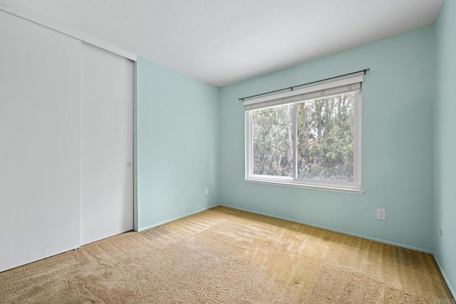 8468 Calle Morelos, San Diego, CA 92126 - unfurnished bedroom with carpet flooring and a closet