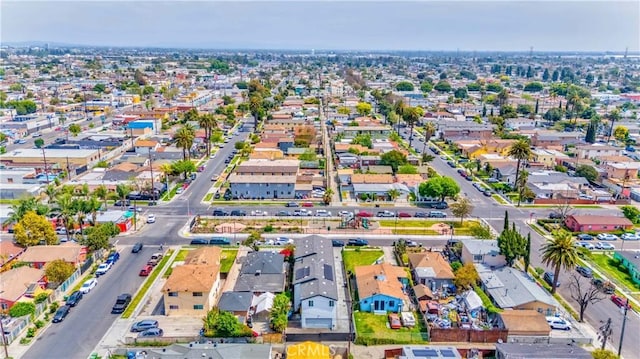 8711 Mckinley Pl, Los Angeles, CA 90002 - aerial view of property and surrounding area with nearby suburban area