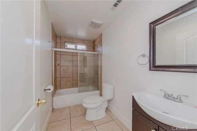 8711 Mckinley Pl, Los Angeles, CA 90002 - bathroom with baseboards, vanity, tile patterned flooring, toilet, and shower / bath combination