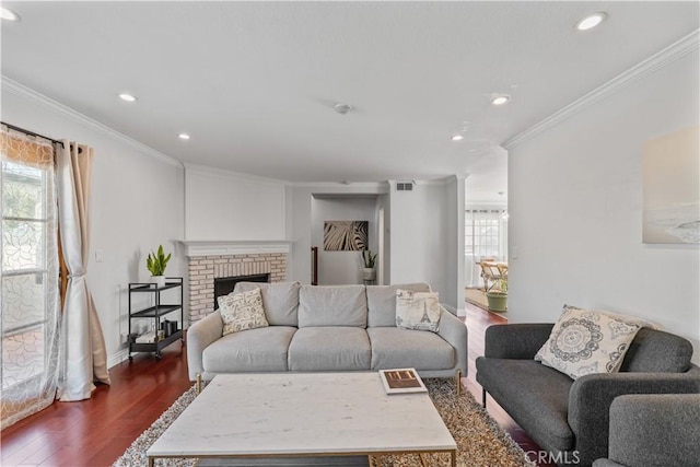 1814 Grant Ave Unit 7, Redondo Beach, CA 90278 - living area with plenty of natural light, dark wood-style floors, recessed lighting, crown molding, and a brick fireplace