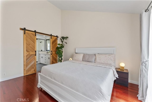 1814 Grant Ave Unit 7, Redondo Beach, CA 90278 - bedroom with wood finished floors and a barn door