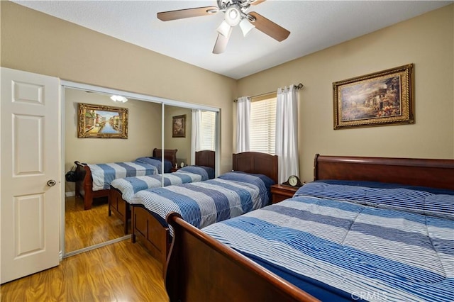 39243 Nicole Dr, Palmdale, CA 93551 - bedroom featuring light wood finished floors, a closet, and a ceiling fan