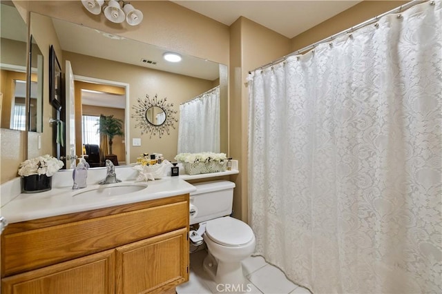 39243 Nicole Dr, Palmdale, CA 93551 - bathroom with toilet, vanity, and tile patterned flooring