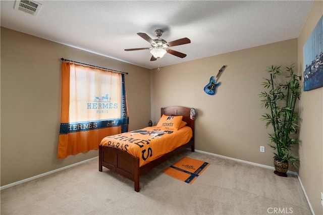 39243 Nicole Dr, Palmdale, CA 93551 - bedroom with light carpet, baseboards, and ceiling fan
