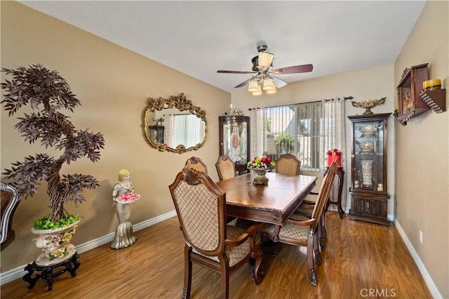 39243 Nicole Dr, Palmdale, CA 93551 - dining room with ceiling fan, wood finished floors, and baseboards