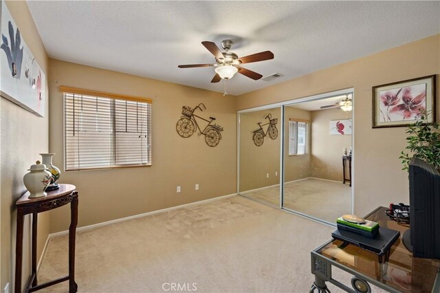 39243 Nicole Dr, Palmdale, CA 93551 - bedroom featuring carpet floors, baseboards, a ceiling fan, and a closet