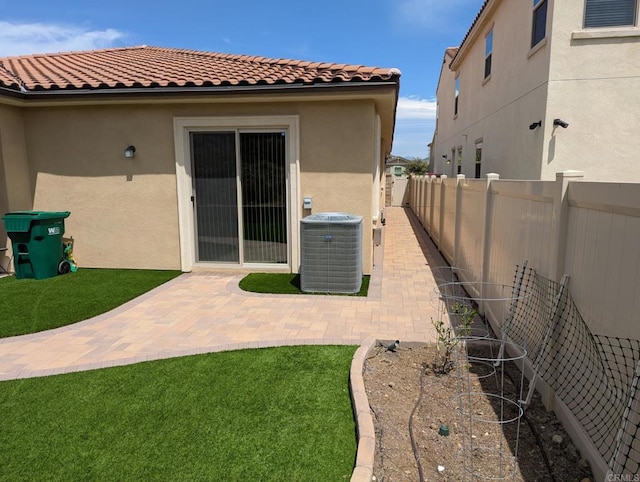 34885 Heartland Ln, Murrieta, CA 92563 - back of house with stucco siding, a fenced backyard, a patio, and a tile roof