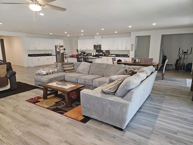 34885 Heartland Ln, Murrieta, CA 92563 - living room featuring ceiling fan, light wood-type flooring, and recessed lighting
