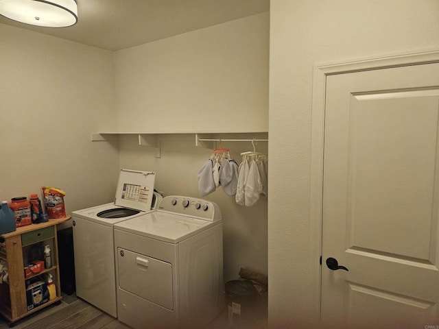 34885 Heartland Ln, Murrieta, CA 92563 - laundry room featuring washing machine and dryer and dark wood finished floors