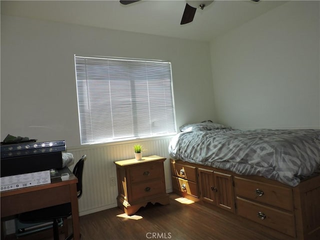 1326 Janes Way, Colton, CA 92324 - bedroom with dark wood-style flooring, wainscoting, ceiling fan, and an office area