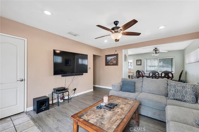 20554 Valerio St, Winnetka, CA 91306 - living room with ceiling fan, recessed lighting, and wood finished floors