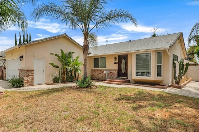 20554 Valerio St, Winnetka, CA 91306 - single story home with a garage, stucco siding, and brick siding
