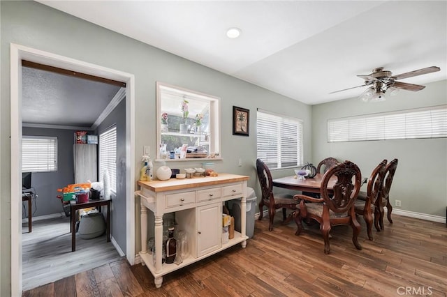 20554 Valerio St, Winnetka, CA 91306 - dining area featuring wood finished floors, a ceiling fan, and crown molding