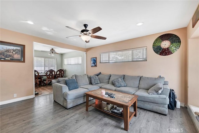 20554 Valerio St, Winnetka, CA 91306 - living area with wood finished floors, ceiling fan, and recessed lighting